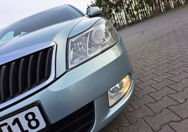 Skoda Octavia cena 24800 przebieg: 153000, rok produkcji 2009 z Pabianice małe 352